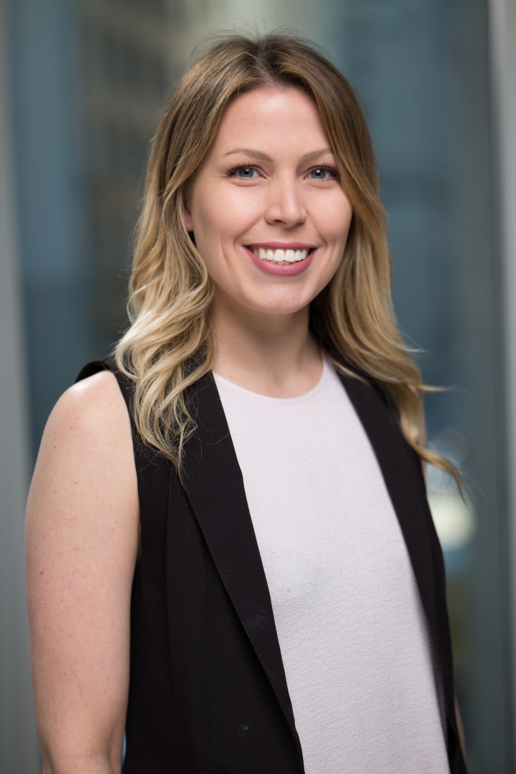 Catherine Snider, CM, smiling and looking forward towards the camera.